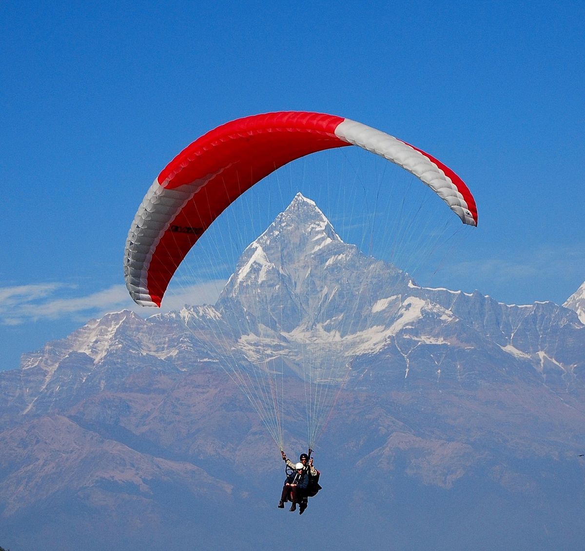 Paragliding Adventure Nepal | Trailblazers Nepal travelers doing paragliding in pokhara with beautiful view of mountain
