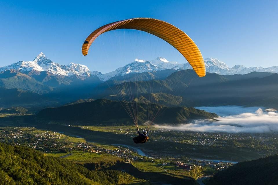 Paragliding Adventure Nepal | Trailblazers Nepal travelers doing paragliding in pokhara with beautiful view