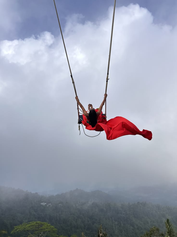 Swing At The Cliff Nepal | Trailblazers Nepal travelers enjoying swing with beautiful view