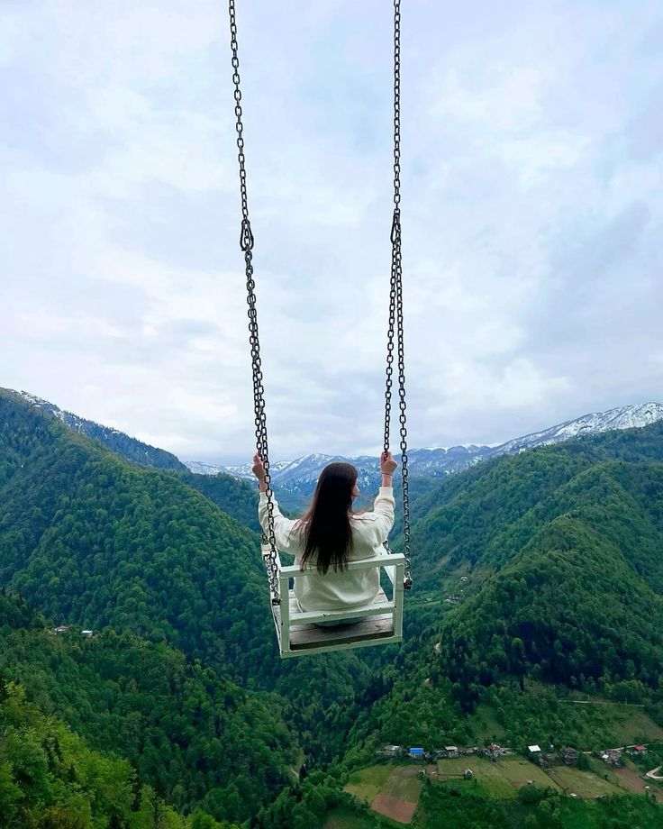 Swing At The Cliff Nepal | Trailblazers Nepal travelers enjoying swing with greenary view